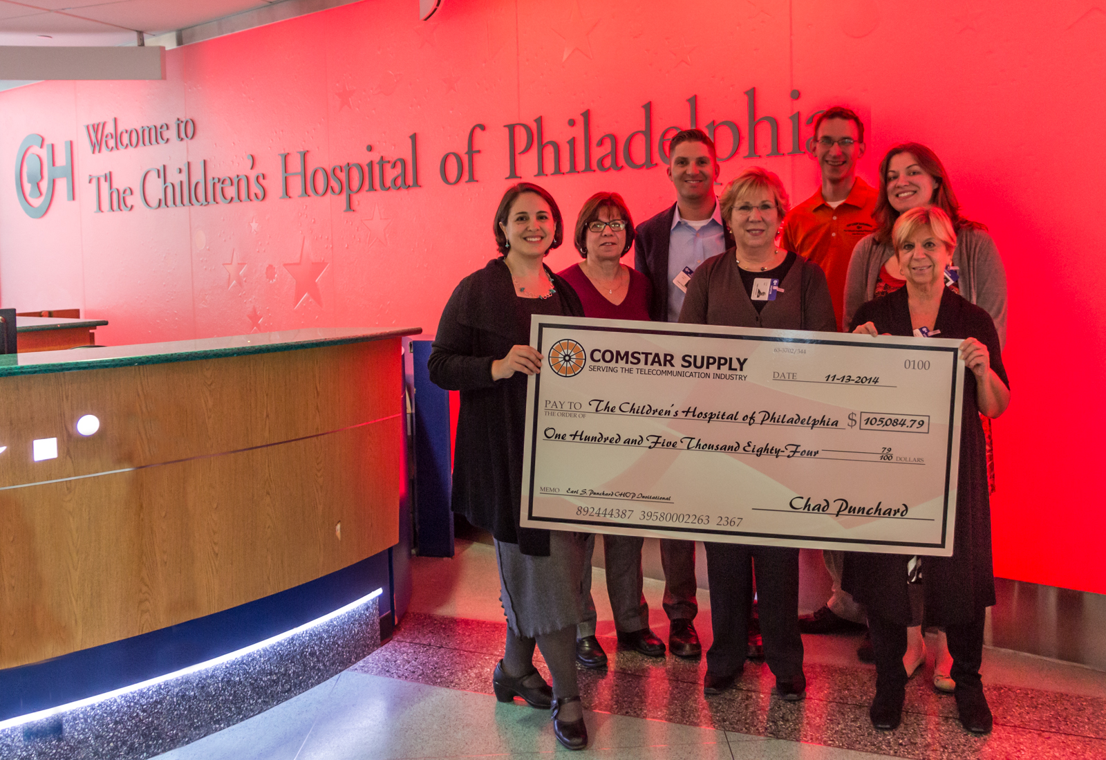 Comstar Supply Presents 2014 Donation to CHOP